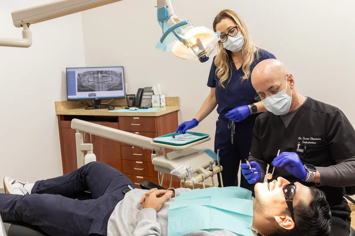 Dentist attending to a patient